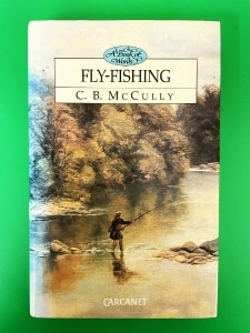 Fly-Fishing: a Book of Words, by C.B. McCully. First Edition, 1992.  Hardback, near-Fine.