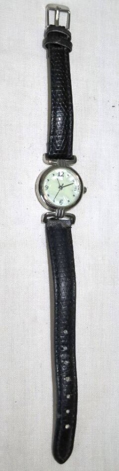 Ladies Quartz Wrist Watch In Chrome Finish And Mother Of Pearl Dial. Black Strap. In Gwo.