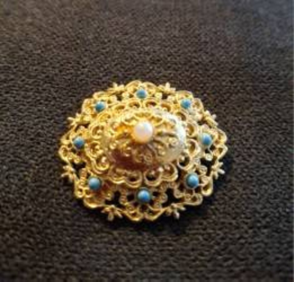 Gold Tone Brooch With Coloured Stones.